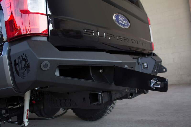 Ford F-250 Rear Bumper - Addictive Desert Designs - HoneyBadger with Lockable Tool Boxes, Backup Sensor Cutouts, and D-Ring Clevis Mounts - Hammer Black and Satin Black - `17-`27